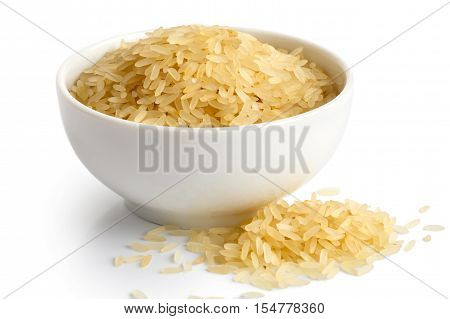 Bowl Of Long Grain Parboiled Rice Isolated On White. Spilled Rice.