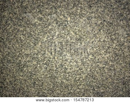 Dark granite stones texture background.Colorful flat rock