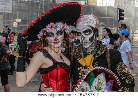 Couple In Tradicional Skull Costume In Zombie Walk Sao Paulo