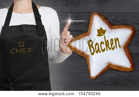 Backen (in German Baking) Cinnamon Star Is Shown By Chef