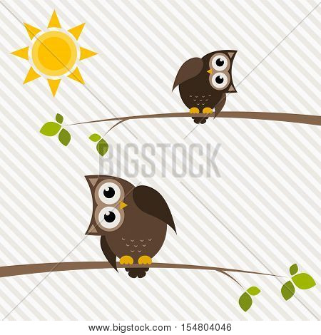brown owl and owlet on the tree