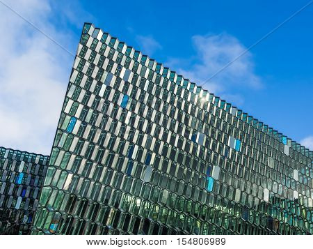 REYKJAVIK, ICELAND - SEPTEMBER 23, 2016: Harpa Concert Hall and Conference Center, which opened on May 4, 2011. Exterior wall showing diagonal lines and contemporary design.