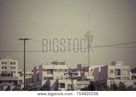 Teheran, Iran - October 03, 2016: Residential Buildings In Front Of Milad Tower In Air-polluted Skyl