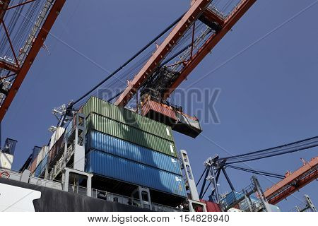 Cranes and carriers in the Port of Rotterdam the Netherlands