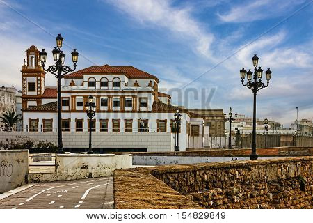 Cadiz town street, Spain. Seafront church building