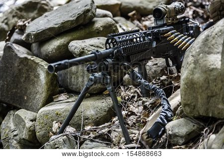 United states army ranger machine gunner in the forest