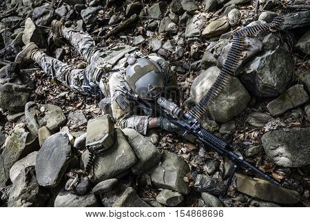 United states army ranger machine gunner in the forest