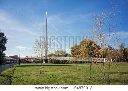 Autumnal capture of Christchurch Meadow and footbridge in Caversham, Reading, UK.