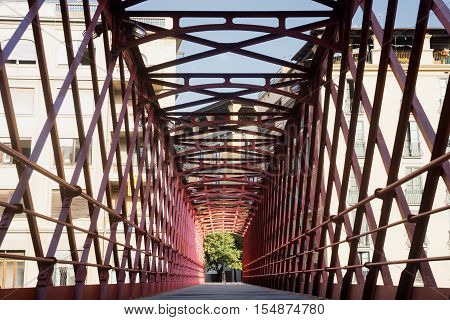 Girona (Gerona Catalunya Spain): red bridge over the Onyant river