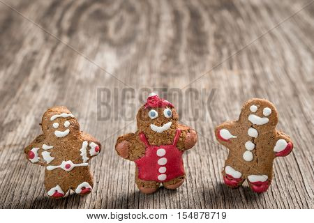 Tree Decorated Gingerman Cookies On Rustic Wooden Background