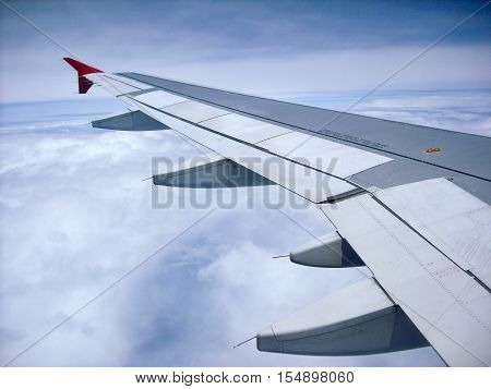 Window view of airplane wing during flight