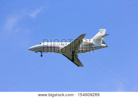 CHIANGMAI , THAILAND -APRIL 1 2014: N28VL. Private AIrcraft, Dassault Falcon 900EX. Landing to Chiangmai airport. Thailand.