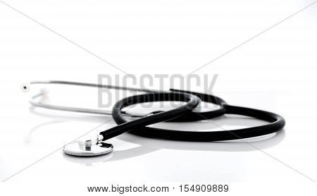 black stetoscope for doctor on white background