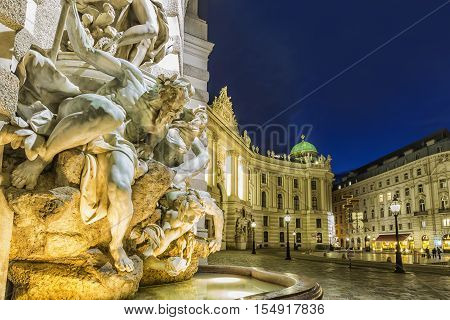 Michaelertrakt Palace, Hofburg In Vienna, Austria. Night View From The Michaelerplatz.
