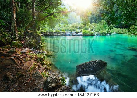 Cascades National Park in Guatemala Semuc Champey at sunset