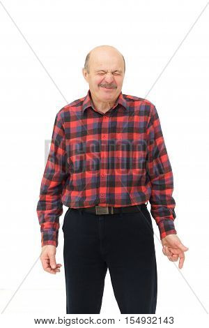 Elderly man's face wrinkled due to sour taste.