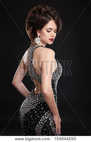 Beautiful Fashion Elegant Woman In Black Sexy Dress And Expensive Jewelry. Glamour Photo. Slim Girl