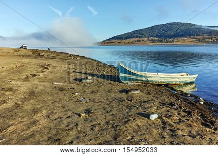 Boat at the coastline of Batak Reservoir, Pazardzhik Region, Bulgaria