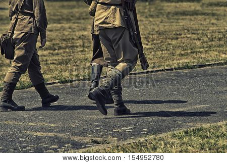 close up on Polish soldier legs on WW2