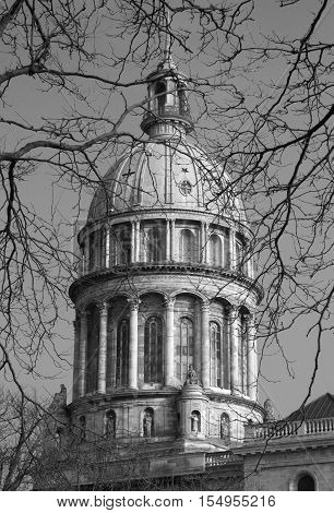Black and white image of the Basilica of Notre-Dame de Boulogne Boulogne-sur-Mer France viewed through trees