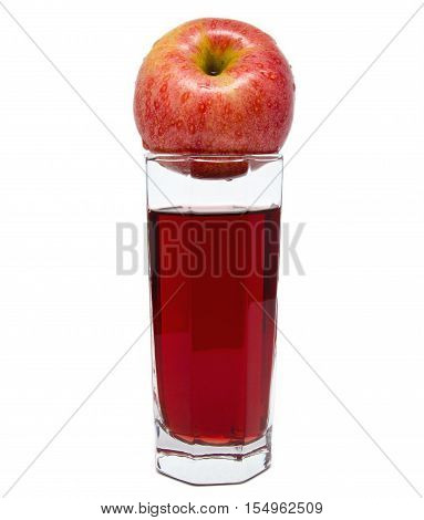 Glass of apple juice with red apple with drops on top isolated on white background
