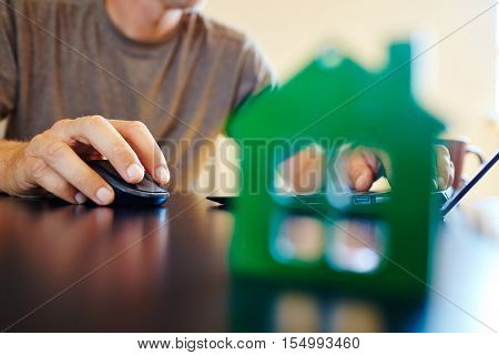 wooden house on the office table
