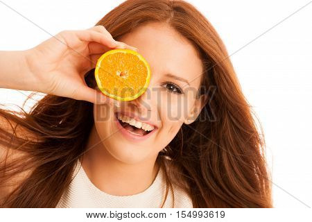 c-vitamine woman - girl with orange fruit in front of her face