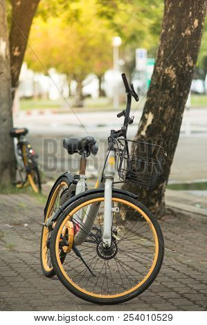Phuket, Thailand - 10 August 2018- Black Yellow Obike Smart Rental Bicycle Parking On Footpath At Sa