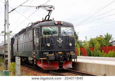 Arboga, Sweden - July 9, 2018: A Black Electric Locomotive Class Rc6 Number 1365 Operated By Sj At T