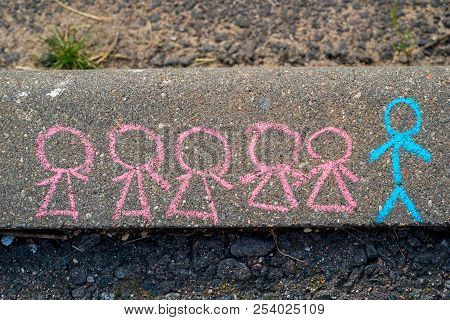 Children's Drawing With Chalk On The Asphalt, The Concept Of Competition And The Leader. Little Men.