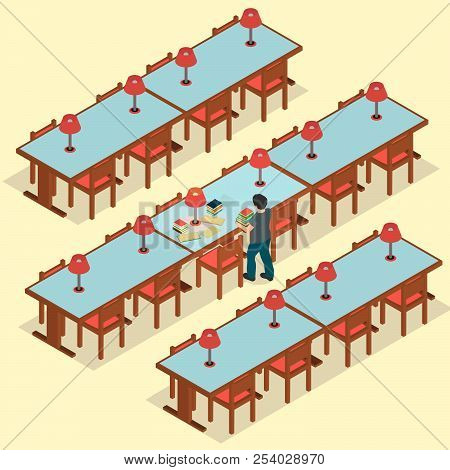 A Boy Is In The Library In His Hands Holding Books.