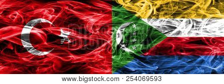 Turkey Vs Comoros Smoke Flags Placed Side By Side. Turkish And Comoros Flag Together