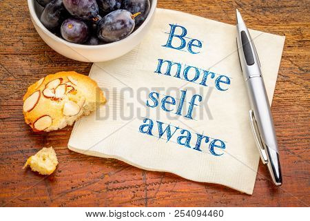 Be more self aware reminder - handwriting on a napkin with grapes and cookie