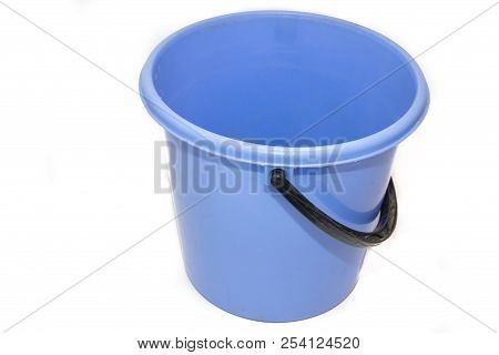 A Bucket On A White Background. Plastic Blue Bucket On A White Background. Bucket For Washing Floors