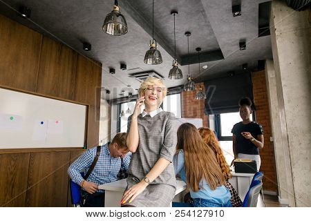 Concept Of Benefitial Links. Young Blonde Is Communion With Her Fellow