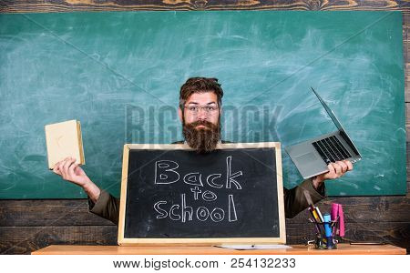 Teacher Welcomes New Pupils Enter Educational Institution. Teacher Or School Principal Welcomes With