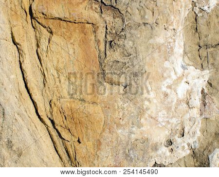 Background Of Weathered, Layered, Granular, Ferruginous Sandstone.