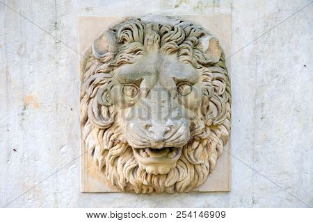 Lions Relief In Park Lazienkowski In Warsaw, Poland