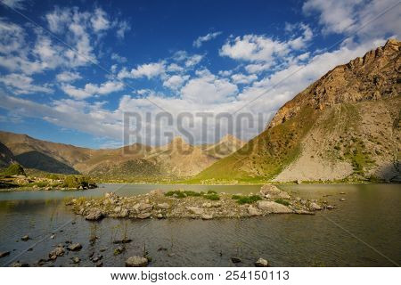 Beautiful serene lake in  Fann mountains (branch of Pamir) in Tajikistan.