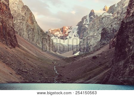 Beautiful serene lake in  Fann mountains (branch of Pamir) in Tajikistan.