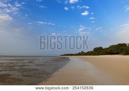 Deserted Beach In The Island Of Orango At Sunset, In Guinea Bissau. Orango Is Part Of The Bijagos Ar