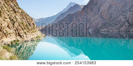 Beautiful serene lake in  Fann mountains (branch of Pamir) in Tajikistan.