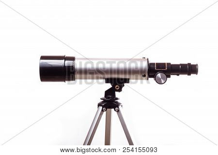 Telescope On A White Background In Studio In France