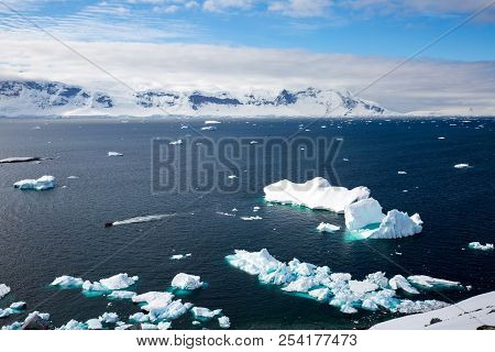 Ice In The Antarctica With Iceberg In The Ocean