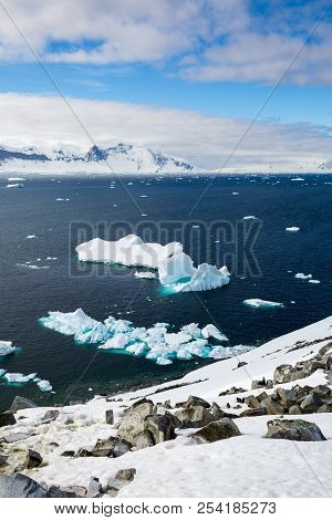 Ice In The Antarctica With Iceberg In The Ocean