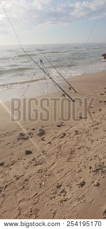 Fishing Rods In The Baltic Sea Beach