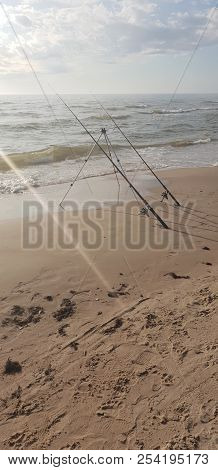 Fishing Rods In The Baltic Sea Beach