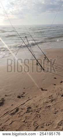 Fishing Rods In The Baltic Sea Beach