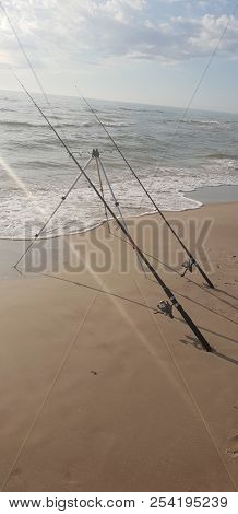 Fishing Rods In The Baltic Sea Beach