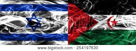 Israel Vs Sahrawi Smoke Flags Placed Side By Side. Israeli And Sahrawi Flag Together